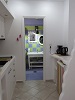 Kitchen and bathroom of the Rose Suite, Captain Zeppos Boutique Suites, Milos, Cyclades, Greece