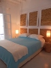 One of the bedrooms at the White Home, Captain Zeppos Boutique Suites, Milos, Cyclades, Greece