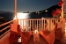 View from a veranda by night , Captain Zeppos Boutique Suites, Milos, Cyclades, Greece